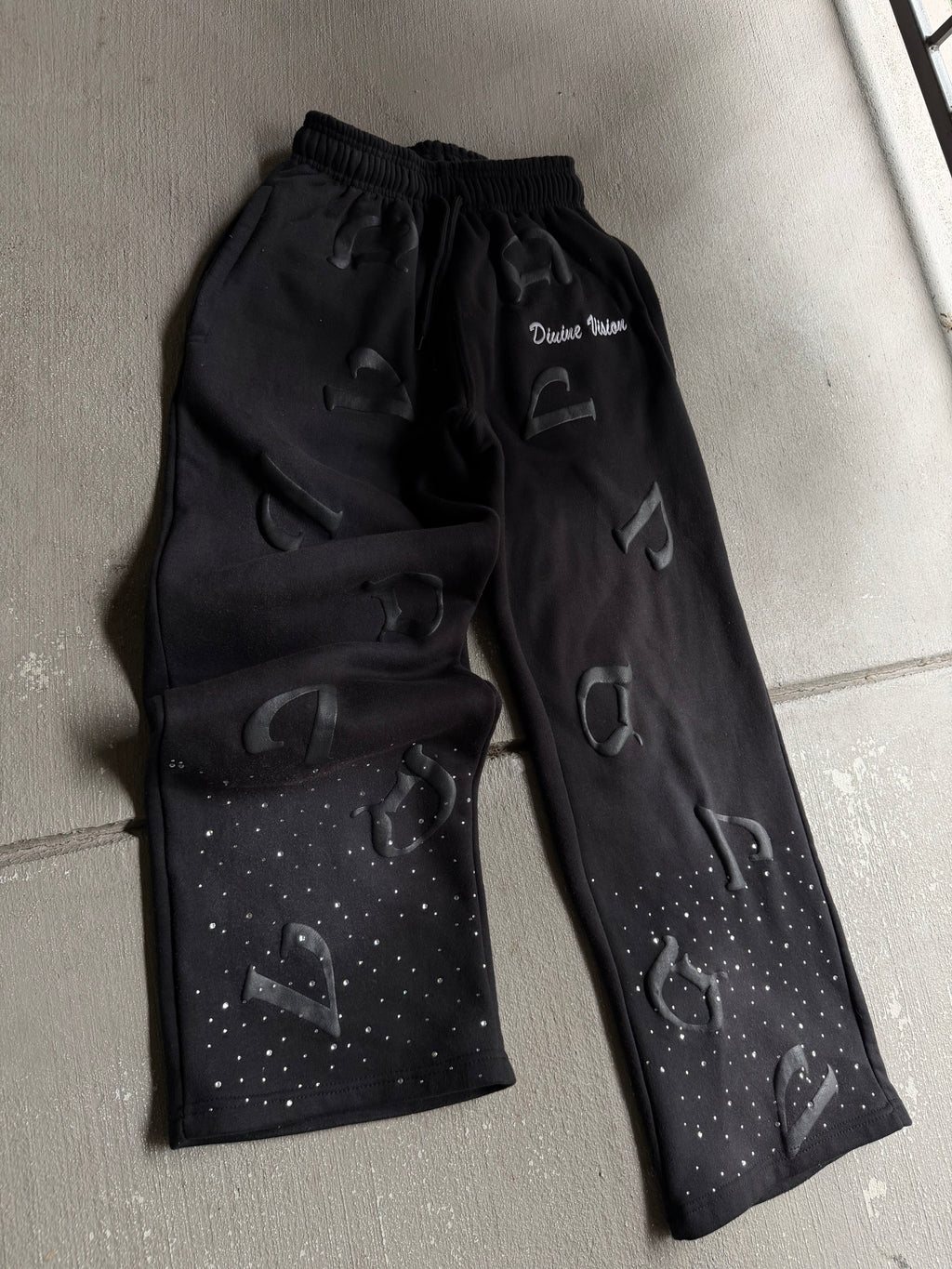 Black “DV” Pants