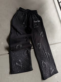 Black “DV” Pants