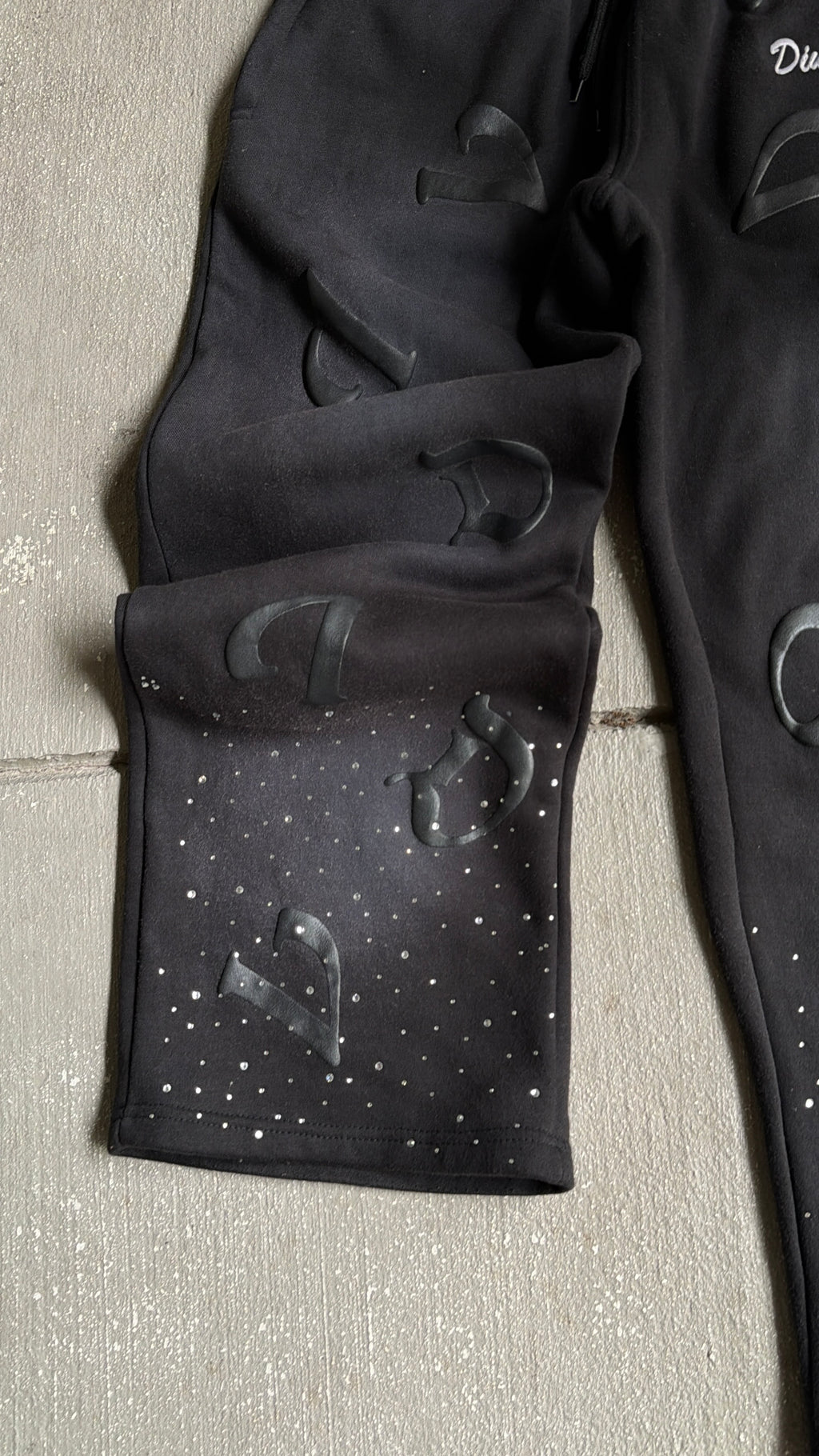 Black “DV” Pants
