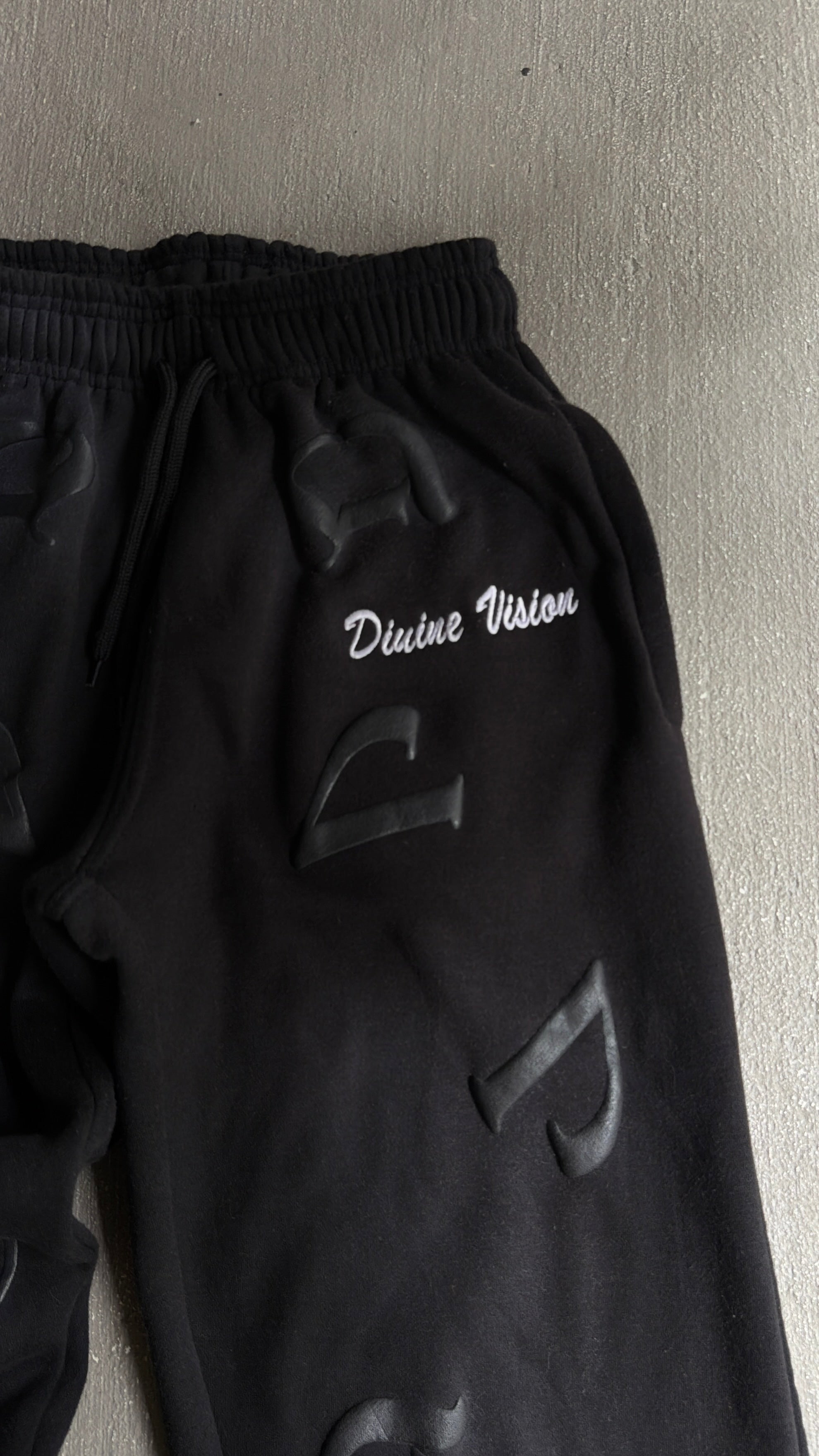 Black “DV” Pants
